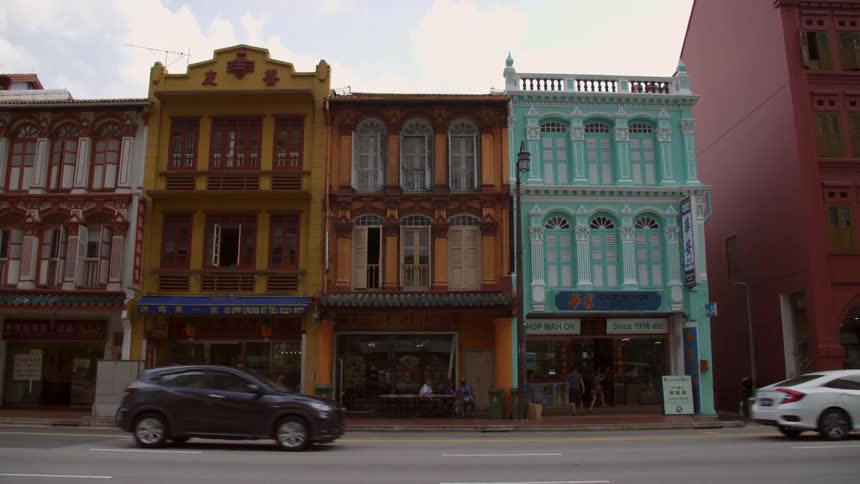 Street level stores and shops on buildings in the street of a small town