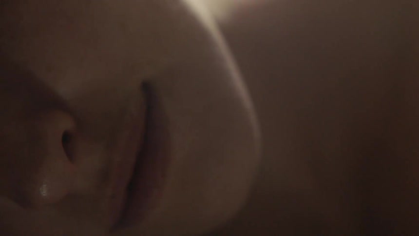 Close up of a partial face of a female with chin nose and lips as subject