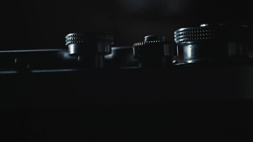 Close up of metal equipment with knobs