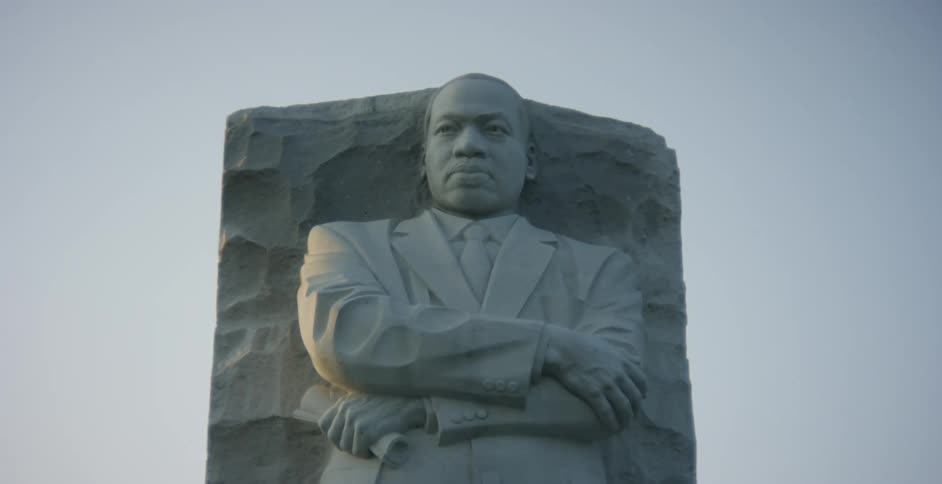 A sculpture of a man made out of stone