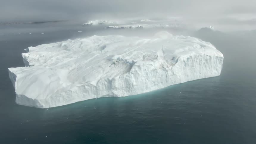 Aerial view of icebergs in the ocean