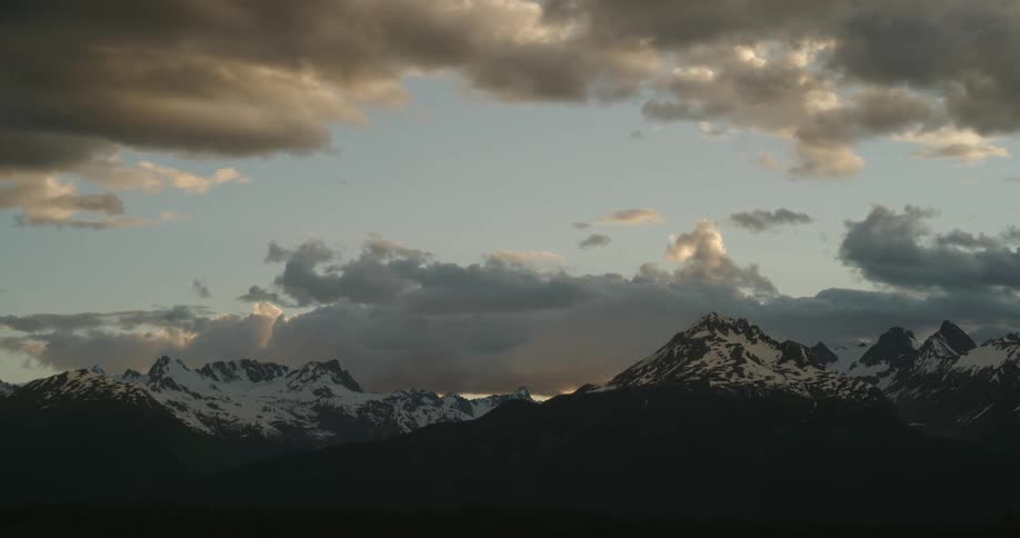 Timelapse of clouds moving over a mountain range