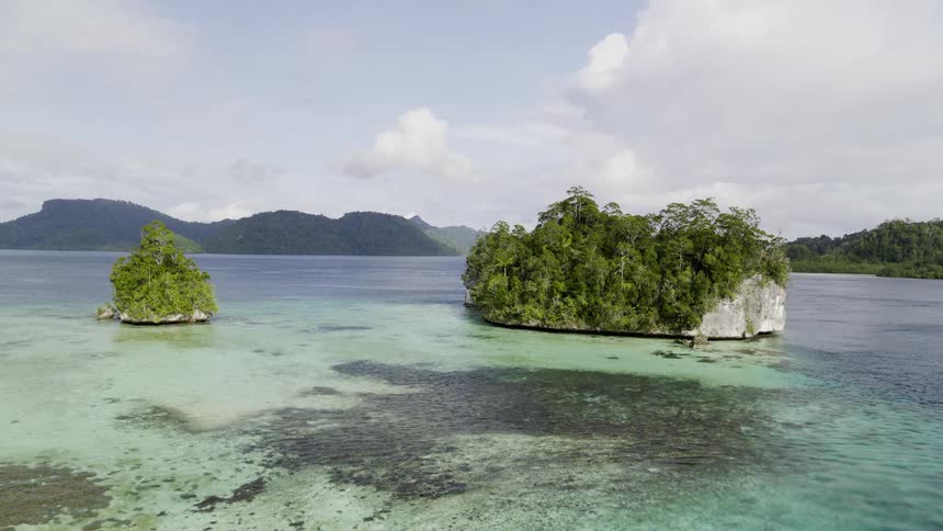 A row of islands are in the water