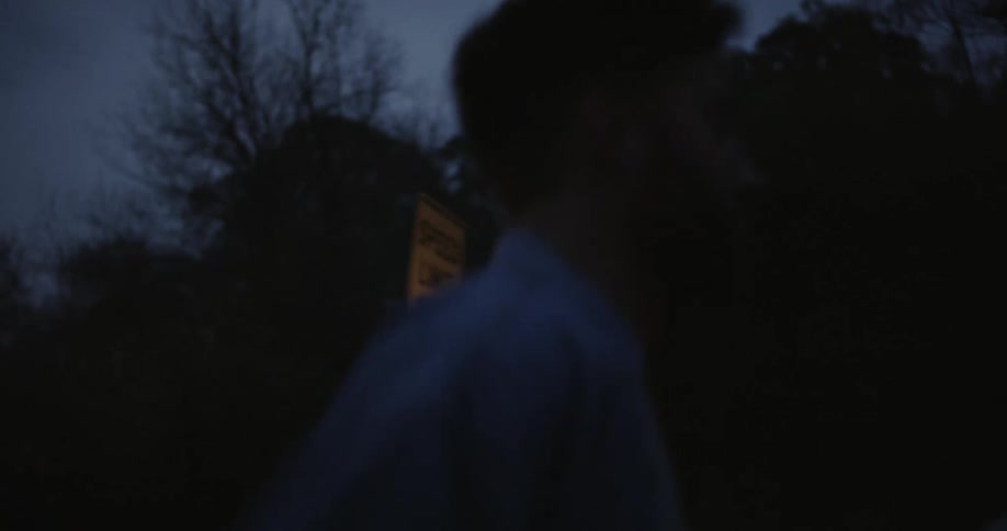 A man is jogging at night