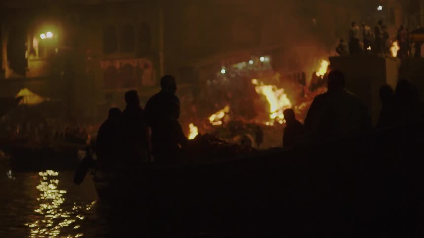 The pier is on fire at night