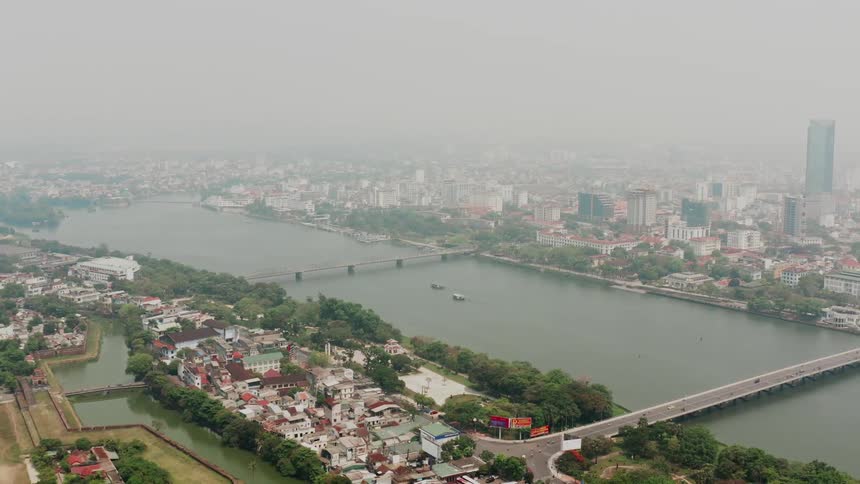 View of a city split by a river