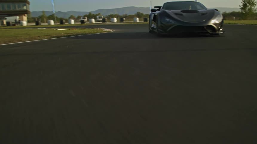 Super car driving around a track