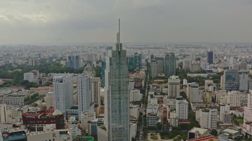 Aerial view of a downtown city is displayed