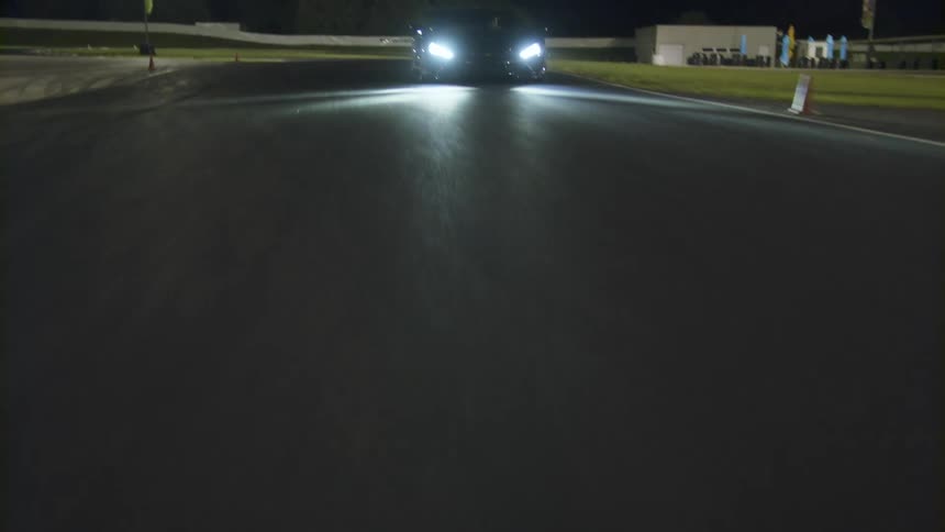 Super car driving on a track