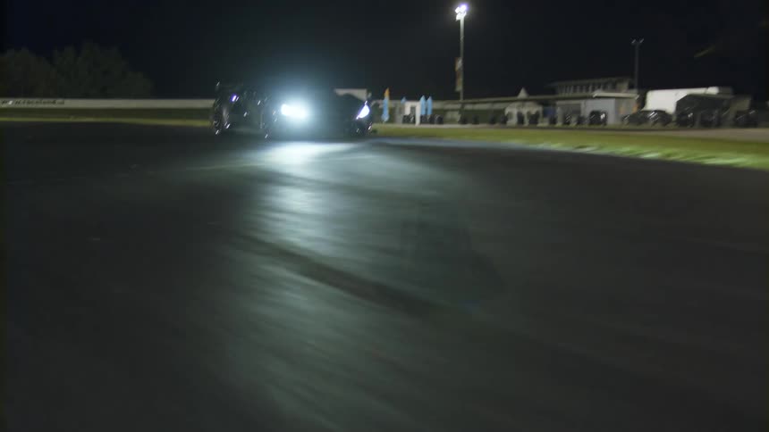 Super car driving on a track