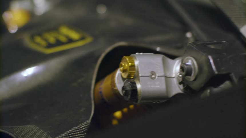 Text label in yellow occupies center of surface on motor