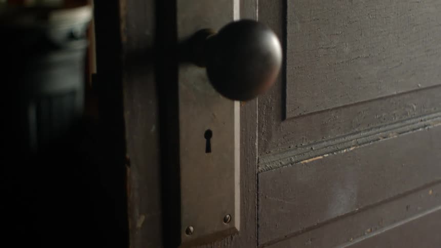 A door is open to a house
