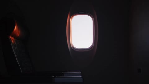 An empty airplane seat inside of an airplane
