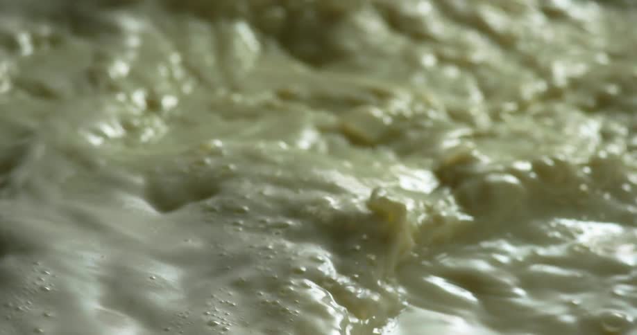 A cream colored liquid with bubbles