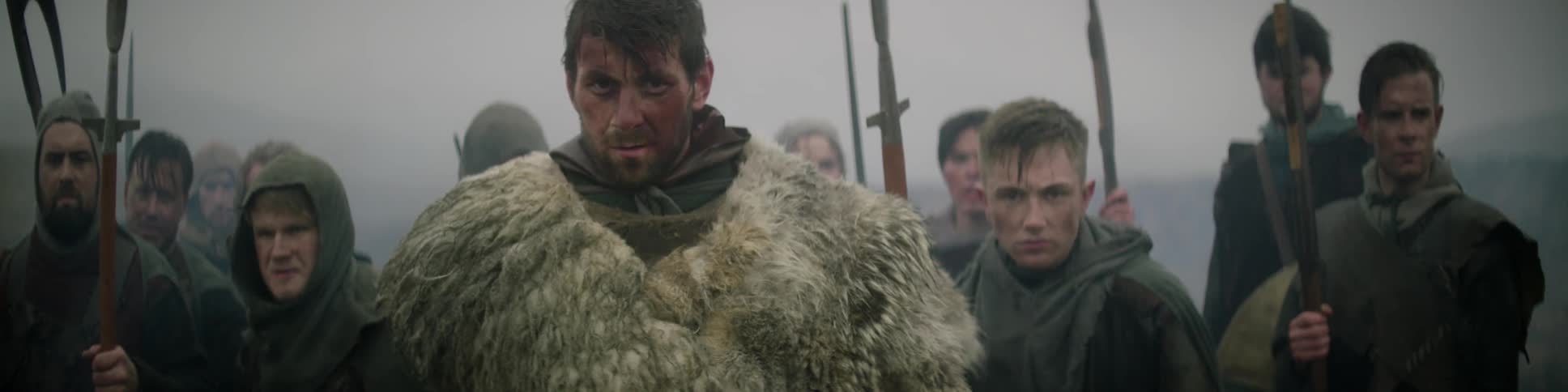 Medieval men gathered with their weapons
