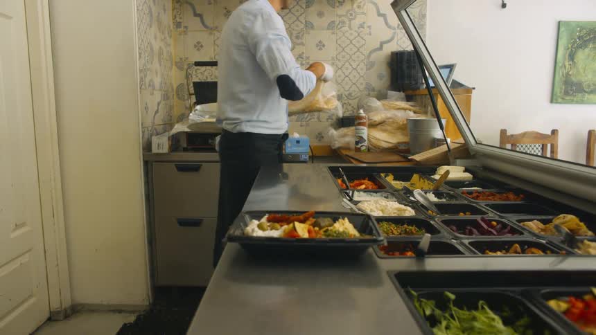Man making food in a store