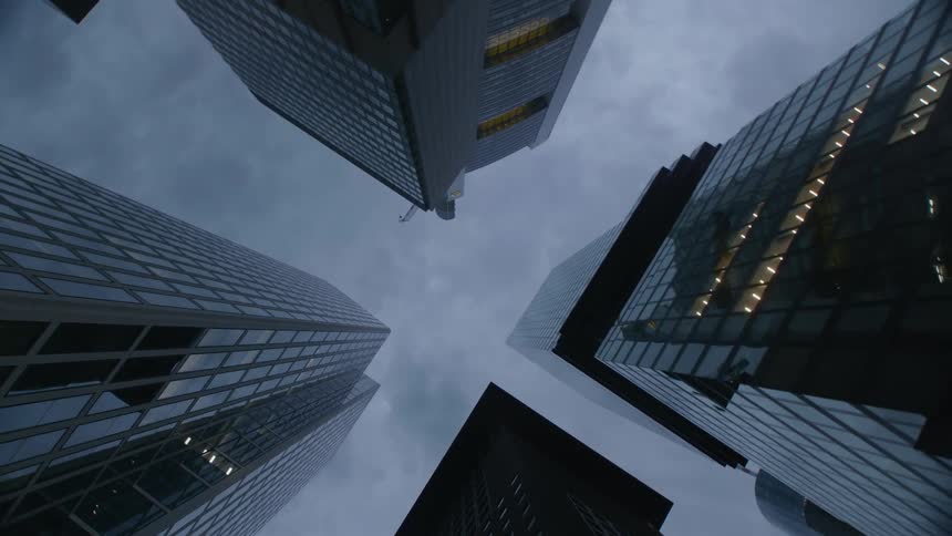 Tall skyscraper buildings on a cloudy day