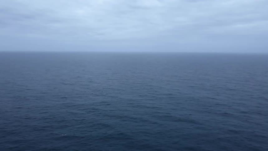 Sky view of an ocean with no surrounding land