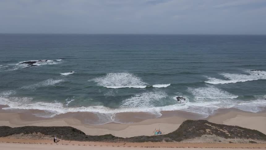 A path runs past the beach