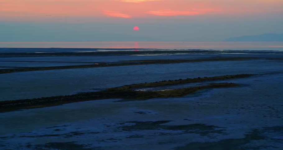 Earth with large crevices as sun sets