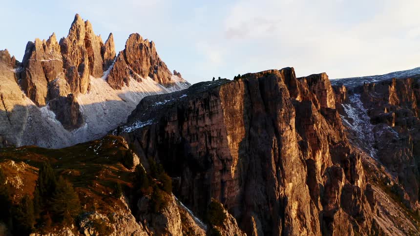 Mountains summit with small amounts of snow in the day time