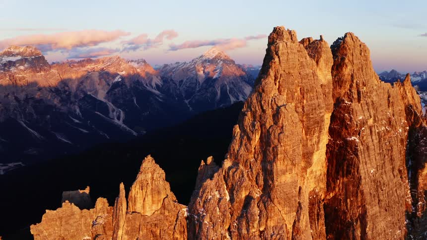 Sunlight leaves the valley between mountains