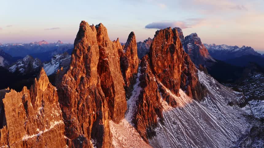 The sun sets over a ridge