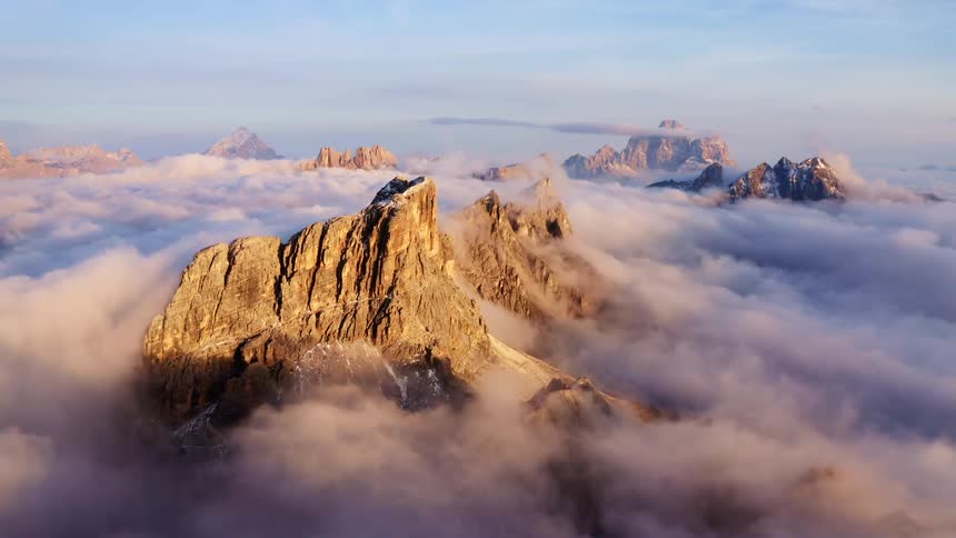 Mountain range and peaks high above the clouds