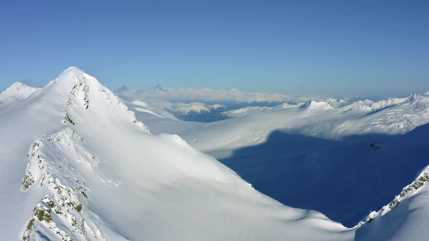 Snow covered mountains on a clear day