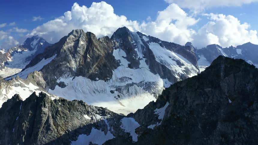 Snow covered mountains on a cloudy day