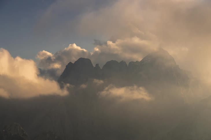 View of a mountain range in the clouds
