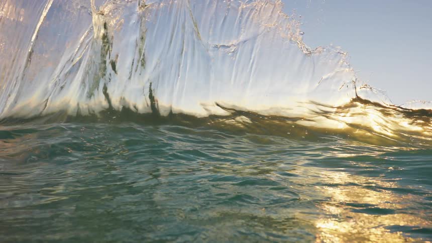Ocean tidal waves pouring forward at day time