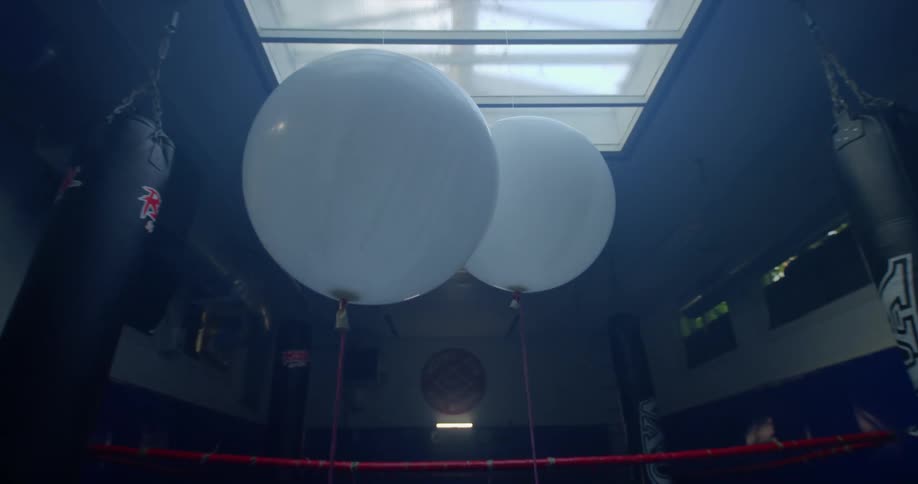 Balloons in a boxing ring