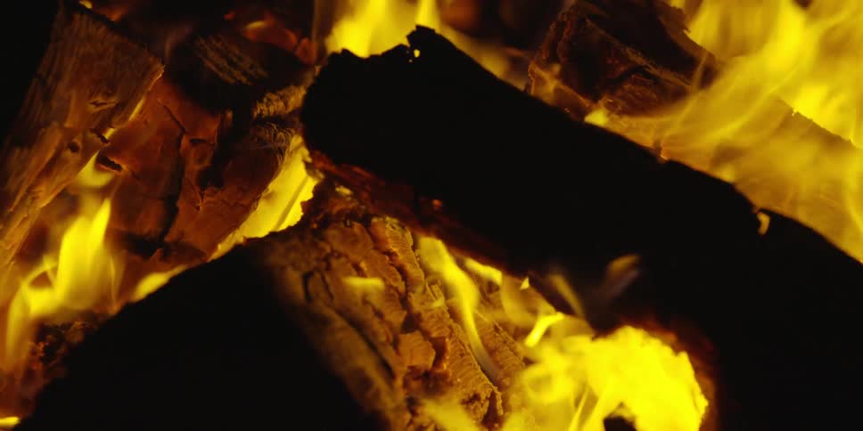 A pile of wood burns