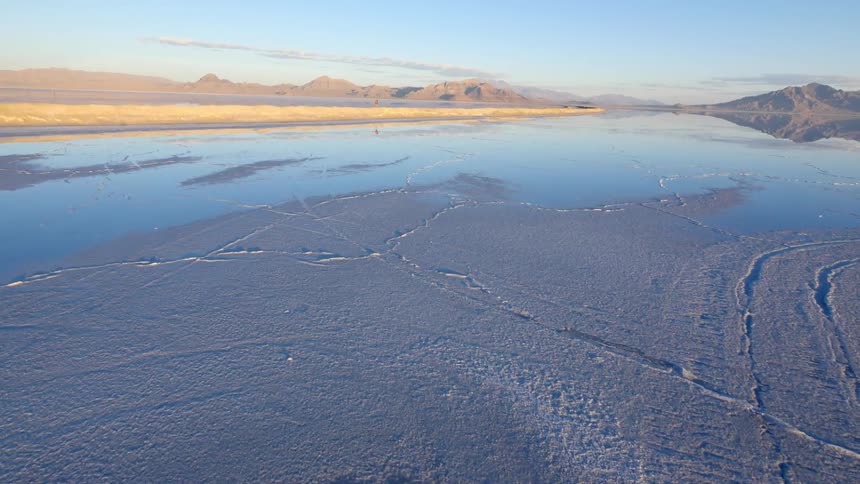 Aerial view moving over a water covered area