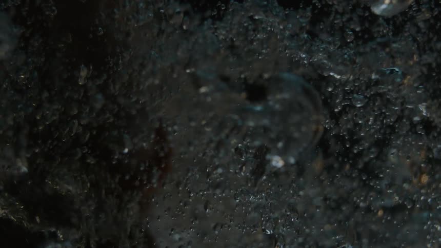 Liquid moving by a force with bubbles everywhere