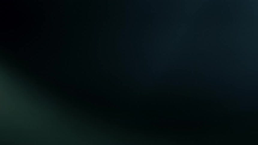 Subtle changes from a black background to a flash with white edges reverting to a black background