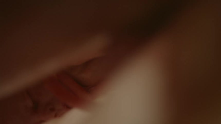 Unborn babys face and umbilical cord in the womb