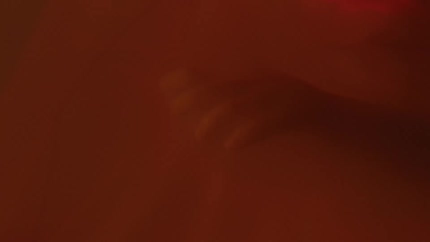 Close up of unborn babys hand in the womb