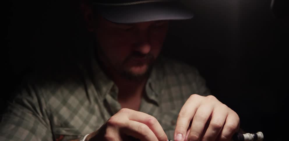 A man working with small tools