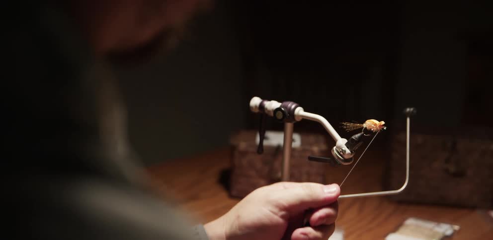 A man is working on a device