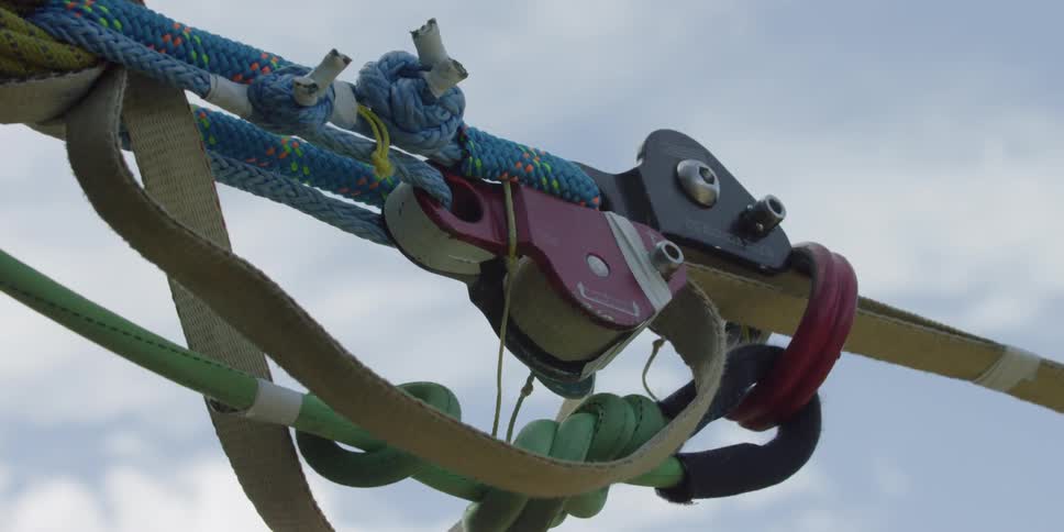 A rope is fastened and there is tension on it