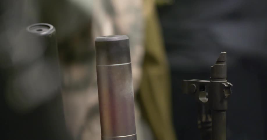 Tops of silver and black guns