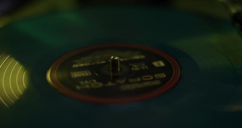 A record is spinning indoors