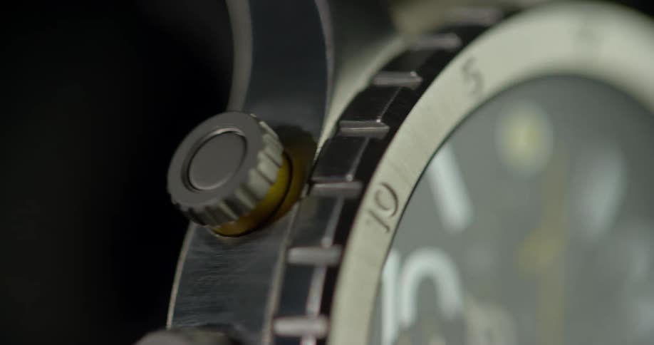A watch turns to face the dial