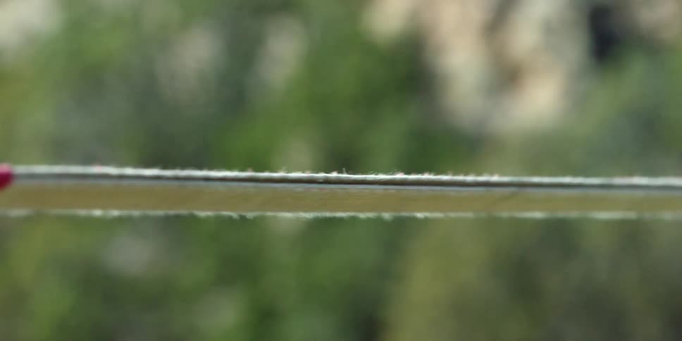 Strap suspended above a large canyon