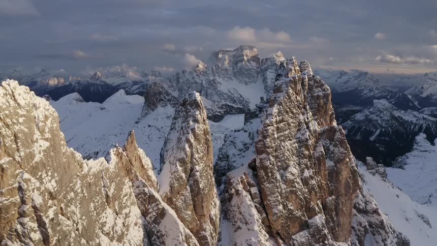 Aerial view of snow capped rugged mountains