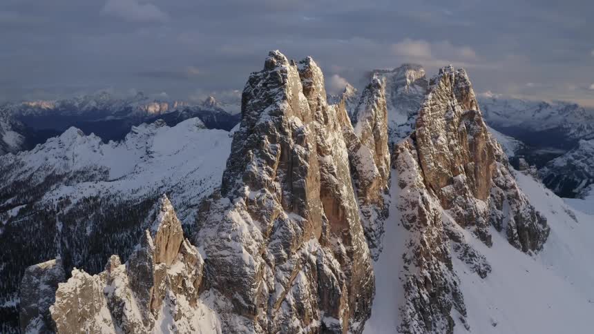 Aerial view of snow capped rugged mountains