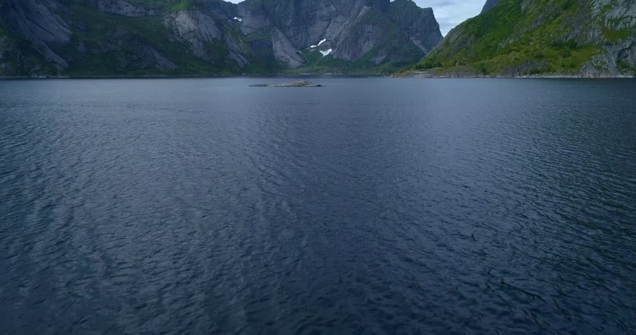Lake inside caldera on a cloudy day