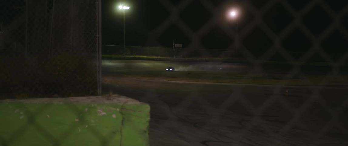 A car racing at night